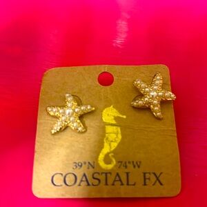 Gold tone pearly post starfish earrings